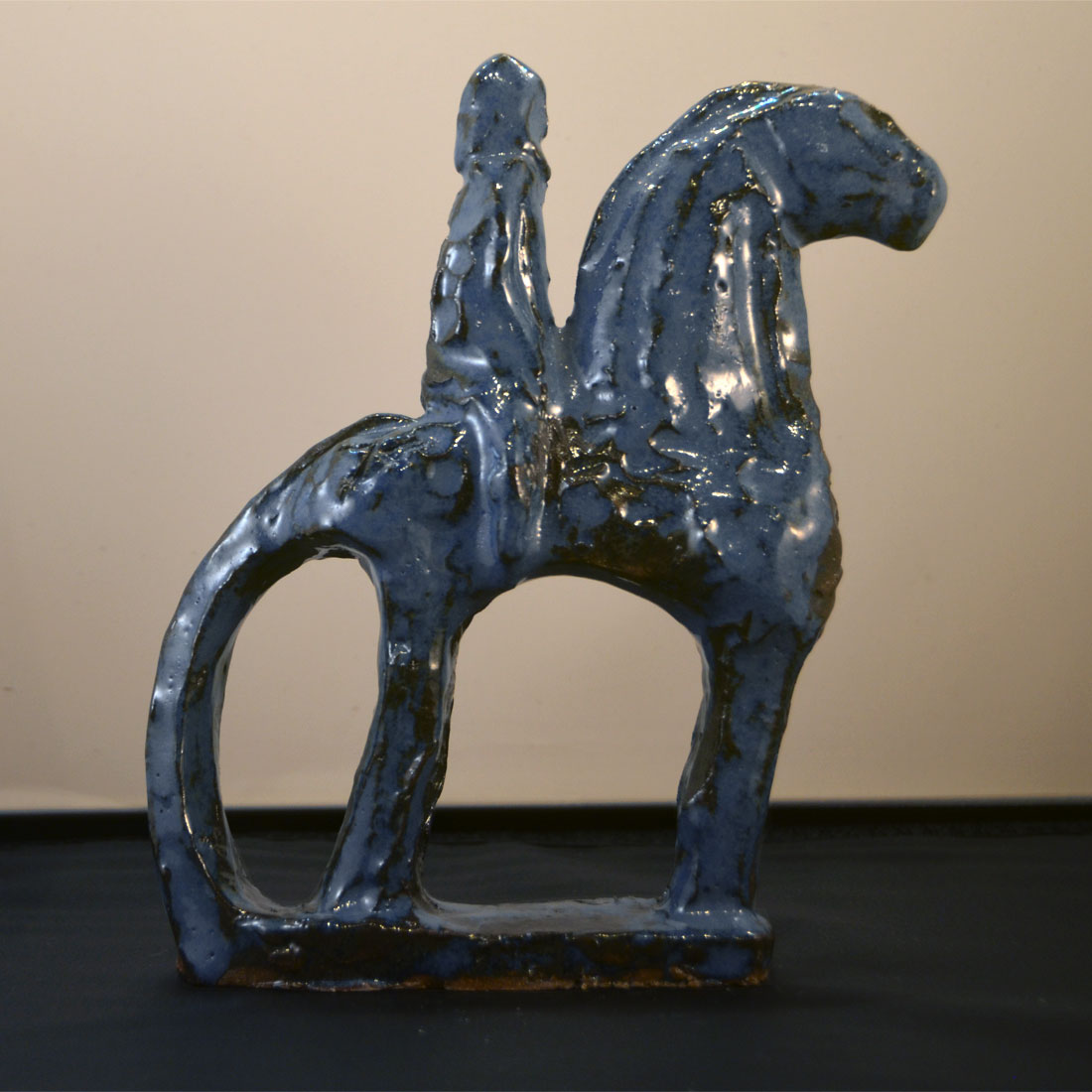 Häst och ryttare i stengods